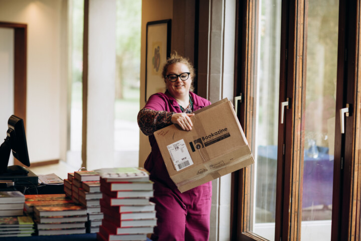 Heffers carrying books
