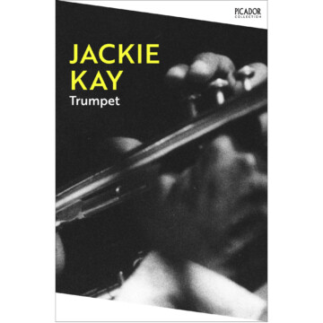 A book cover with a black and white close-up of hands playing the trumpet.
